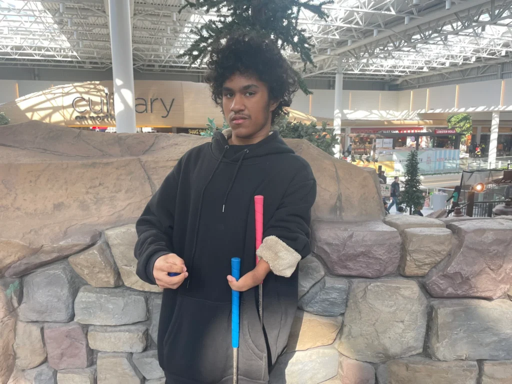 Angelo Client Story image of him playing mini golf