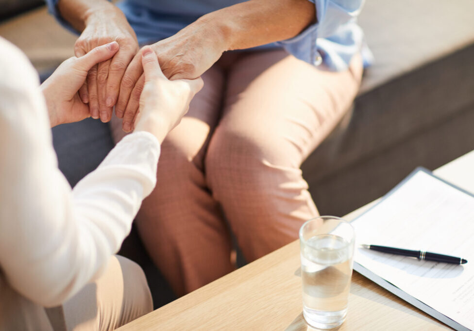 Photo of a home care worker and her client